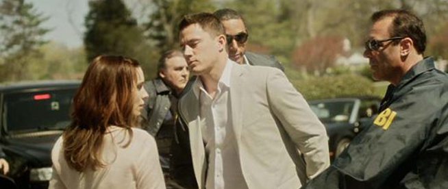 Emily (Rooney Mara) looks on as her husband Martin (Channing Tatum) gets arrested