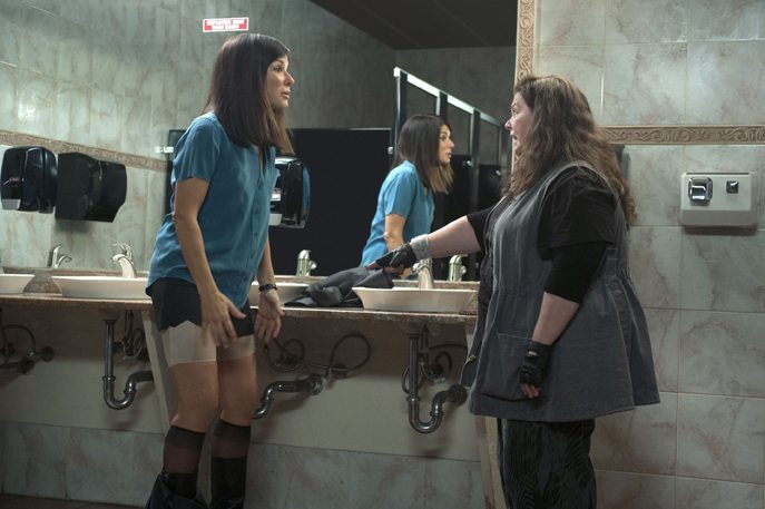 Special Agent Sarah Ashburn (Sandra Bullock) explains and displays the magic properties of Spanx to her new partner, Boston Detective Shannon Mullins (Melissa McCarthy)