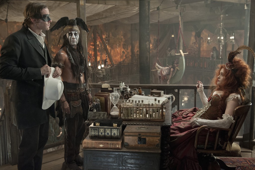Lone Ranger and Tonto meet with madam Red Harrington (Helena Bonham Carter)