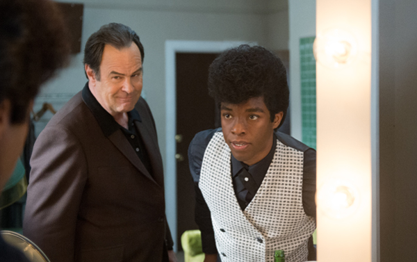 Boseman as Brown with Dan Aykroyd as his manager Ben Bart
