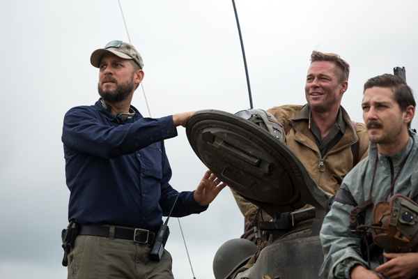 Director David Ayer with Brad Pitt and Shia LaBeouf on the set of FURY