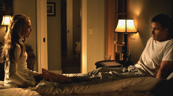 Bill (James Patrick Stuart) and Susan (Brittany Murphy) discuss their problems concerning Christine