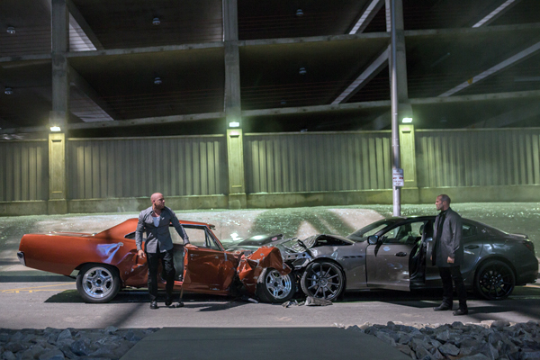 Dom Toretto (Vin Diesel) faces off against Deckard Shaw (Jason Statham)