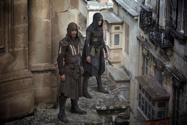 Through a revolutionary technology that unlocks his genetic memories, Callum Lynch (Michael Fassbender) experiences the adventures of his ancestor, Aguilar, in 15th Century Spain with Maria (Ariane Labed). Photo Credit: Kerry Brown.