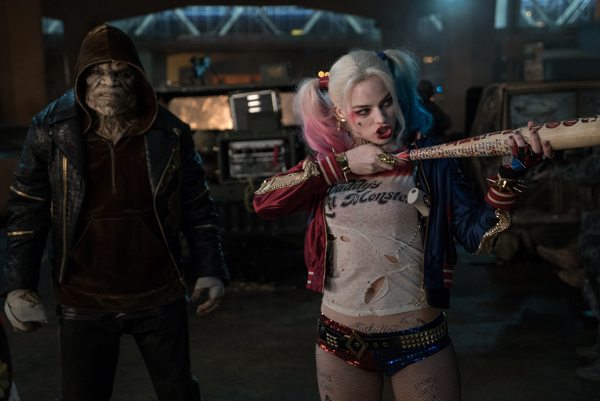 ADEWALE AKINNUOYE-AGBAJE as Killer Croc and MARGOT ROBBIE as Harley Quinn