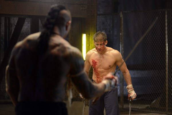 Alain Moussi as Kurt Sloane and Dave Bautista as Tung Po  in KICKBOXER: VEGEANCE