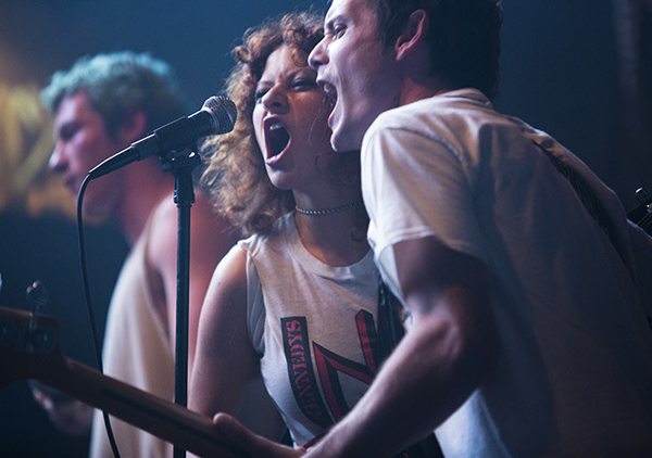 Callum Turner as Tiger, Alia Shawkat as Samantha and Anton Yelchin as Pat in GREEN ROOM