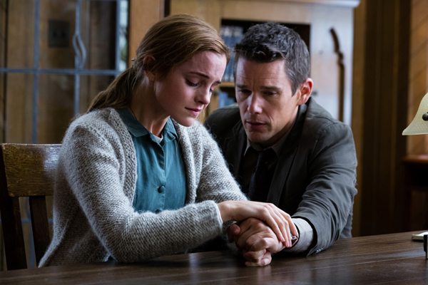 Angela (Emma Watson) confides in Detective Kenner (Ethan Hawke) 