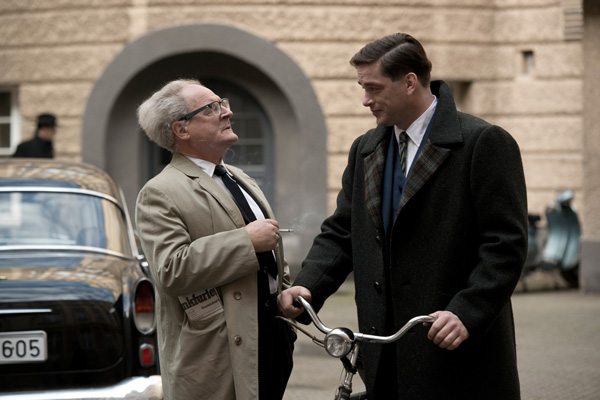 Burghart Klaussner as Fritz Bauer and Ronald Zehrfeld as Karl Angermann
