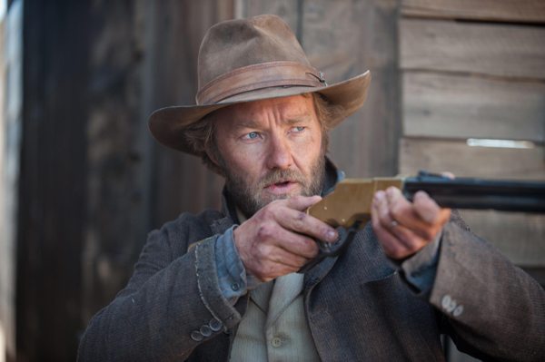Dan Frost (Joel Edgerton) takes aim in Jane Got a Gun