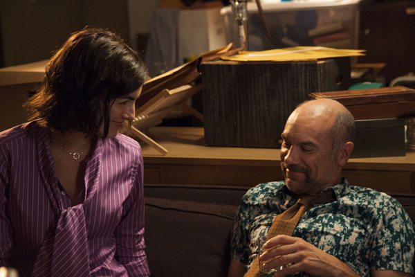 Emily Chase (Camilla Belle) tries to convince Charlie (Greg Stuhr) to take her proposition