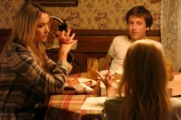 Hardy (Skyler Gisondo) brings Bo (Katrina Bowden) for dinner with his mother (Kristin Chenoweth) in Hard Sell