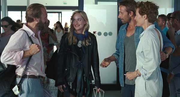(From L-R): Ralph Fiennes as "Harry," Dakota Johnson as "Penelope," Matthias Schoenaerts as "Paul" and Tilda Swinton as "Marianne" in A BIGGER SPLASH. Photo by Jack English. © 2016 Twentieth Century Fox Film Corporation All Rights Reserved