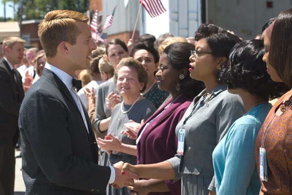 Katherine G. Johnson (Taraji P. Henson), flanked by fellow mathematicians Dorothy Vaughan (Octavia Spencer) and Mary Jackson (Janelle Monáe) meet the man they helped send into orbit, John Glenn (Glen Powell), in HIDDEN FIGURES. Photo Credit: Hopper Stone.