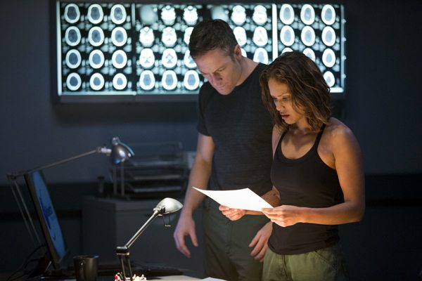 Major John Cafferty (Tahmoh Penikett) and Guts ( find clues to their identity