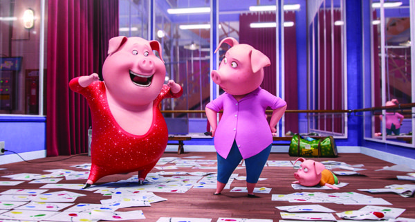 NICK KROLL voices boisterous German pig Gunter and Academy Award® winner REESE WITHERSPOON voices overtaxed mother Rosita in the event film “Sing,”