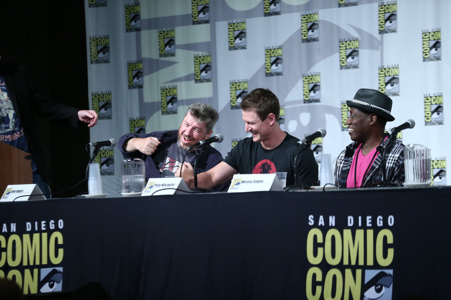 COMIC-CON INTERNATIONAL: SAN DIEGO 2015 -- "The Player" Panel & Red Carpet -- Pictured: (l-r) John Rogers, Executive Producer, Writer; Philip Winchester, Wesley Snipes, Thursday, July 9, 2015, from San Diego Convention Center, San Diego, Calif. -- (Photo by: Mark Davis/NBC)
