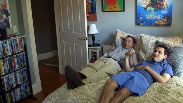 Owen Suskind and his dad watching The Little Mermaid