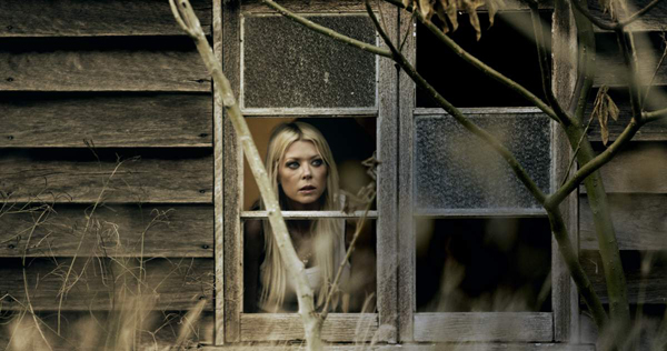 Tara Reid as Natasha in Charlie's Farm