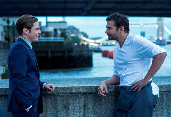 Tony Bilardi (Daniel Bruhl) makes a deal with Adam (Bradley Cooper) in BURNT