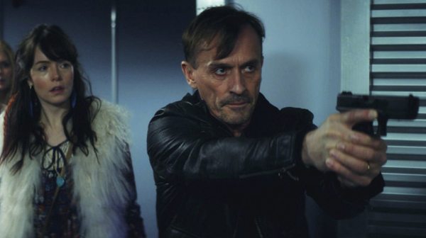 Willor (Valene Kane) and Detective Burns (Robert Knepper) in THE HOARDER