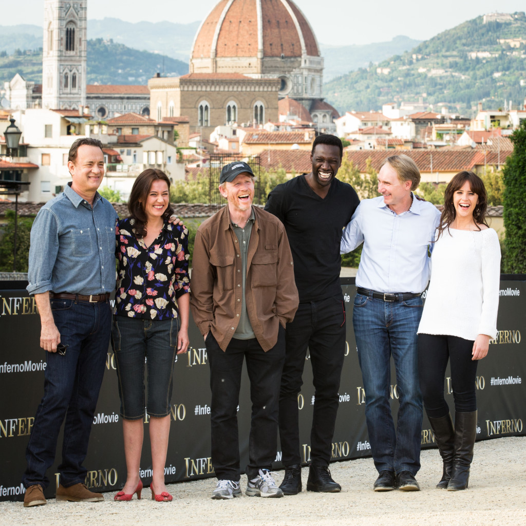 Sony Pictures Entertainment commences principal photography in Florence, Italy on “INFERNO," the new film in the billion-dollar Robert Langdon franchise, based on Dan Brown’s bestselling series of books.   Pictured: (Left to Right) Tom Hanks (“Robert Langdon”);  Sidse Babett Knudsen (“Dr. Elizabeth Sinskey”); Ron Howard, director/producer; Omar Sy (“Christoph Bouchard”); Dan Brown “Inferno” Author; Felicity Jones (“Dr. Sienna Brooks”);   - Event Date: 11 May 2015